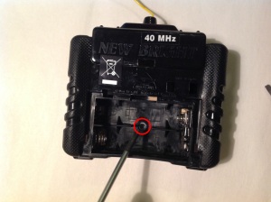 Back of controller with screw to remove